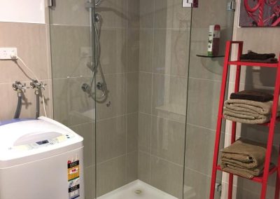 Diamond shower screen in laundry bathroom layout