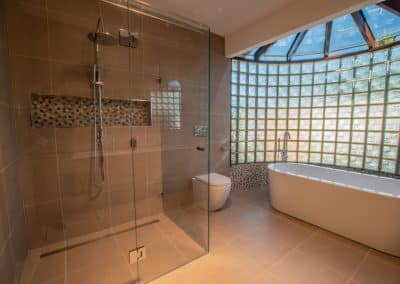 Custom frameless glass shower screen installed in an Altona Meadows bathroom renovation