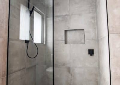 Full height black frame shower screen panel
