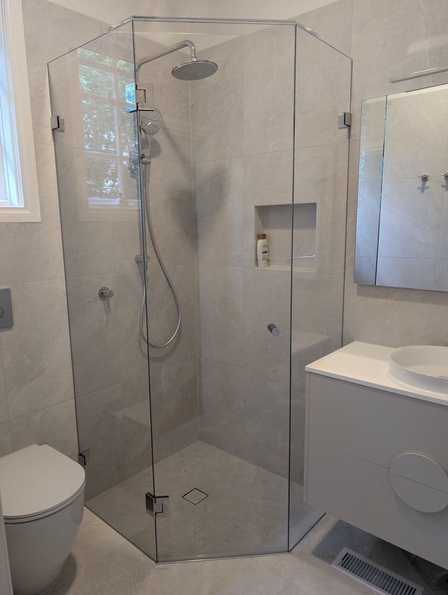 Diamond shape low-iron shower screen installed in Essendon