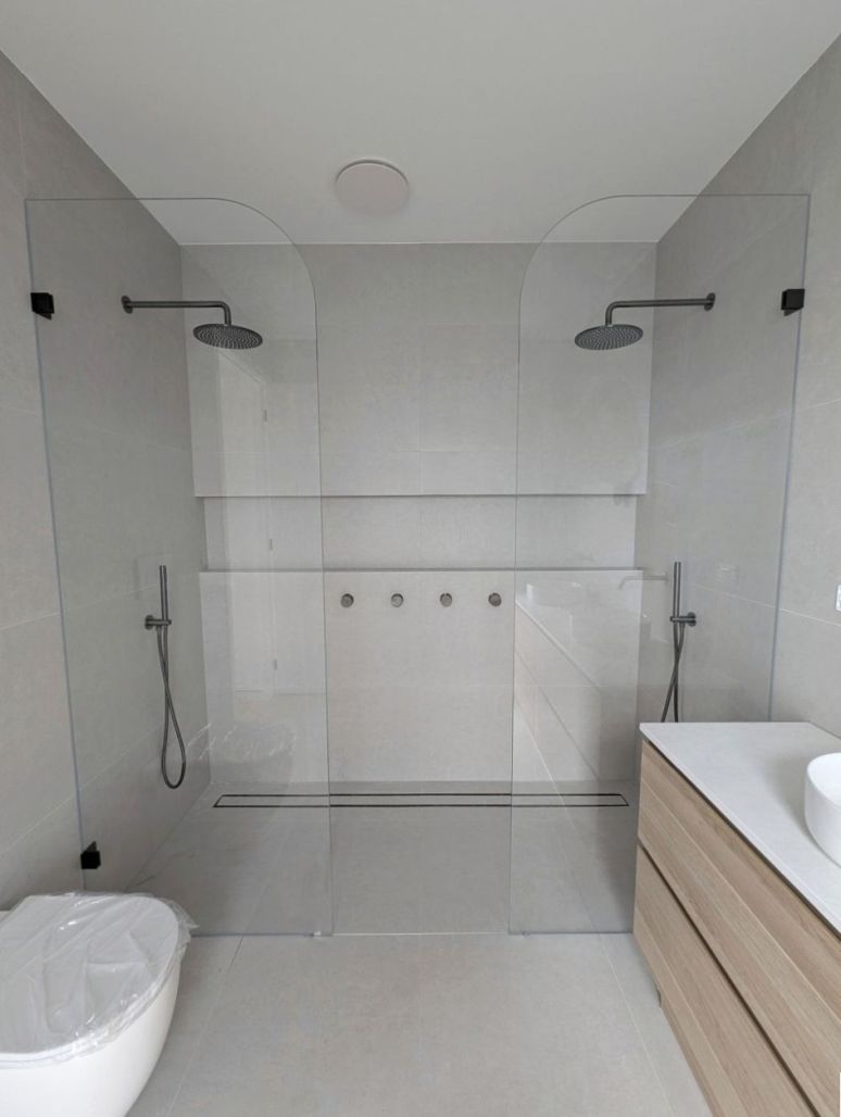 Curved Glass Shower panels with an opening for a walk in shower