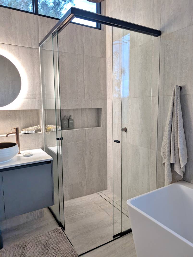 Corner Entry Shower screen Brushed Nickel Corner-entry sliding door shower screen with black frame and wall hang vanity