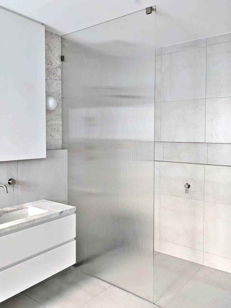 Full height fluted glass shower panel wall hang vanity and niche